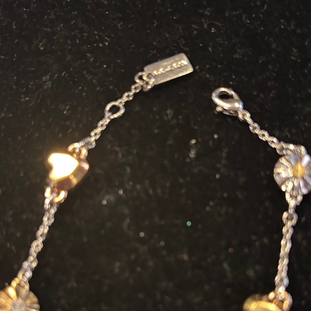 Coach Two-Tone Silver and Gold Daisy & Heart Link Bracelet - Picture 3 of 4